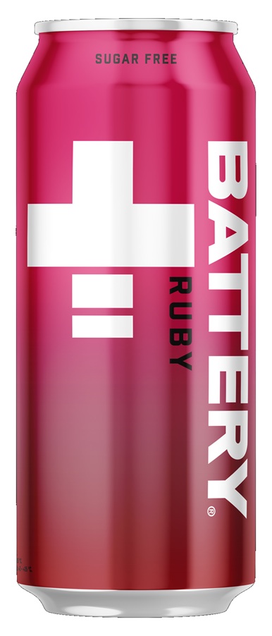 A bright pink Battery Sugar Free Raspberry Pomegranate energy drink can stands beside a stemmed glass containing a translucent pink-red drink on a wooden table.